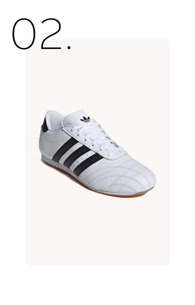 Witte smalle Adidas sneakers met zwarte strepen