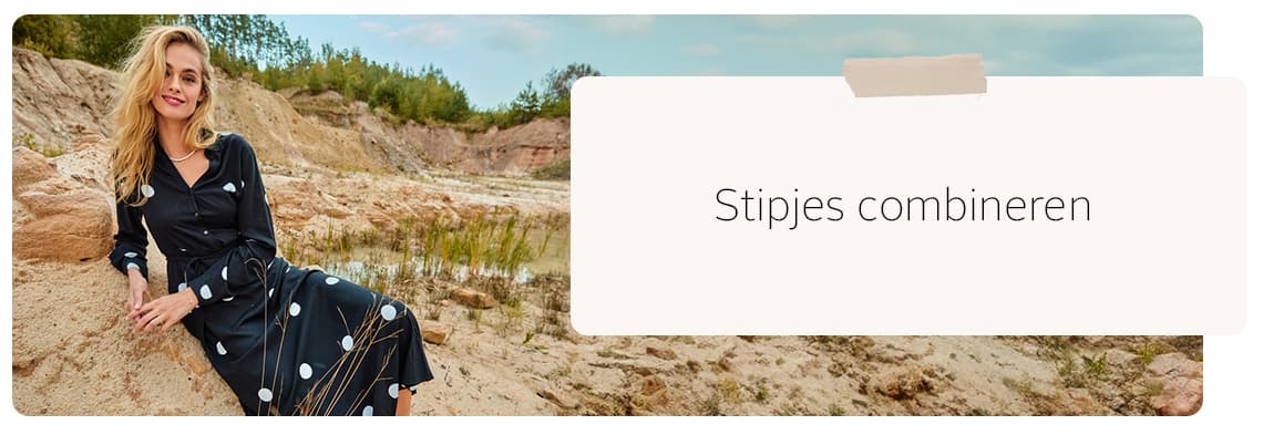 Vrouw buiten in een jurk met stippen