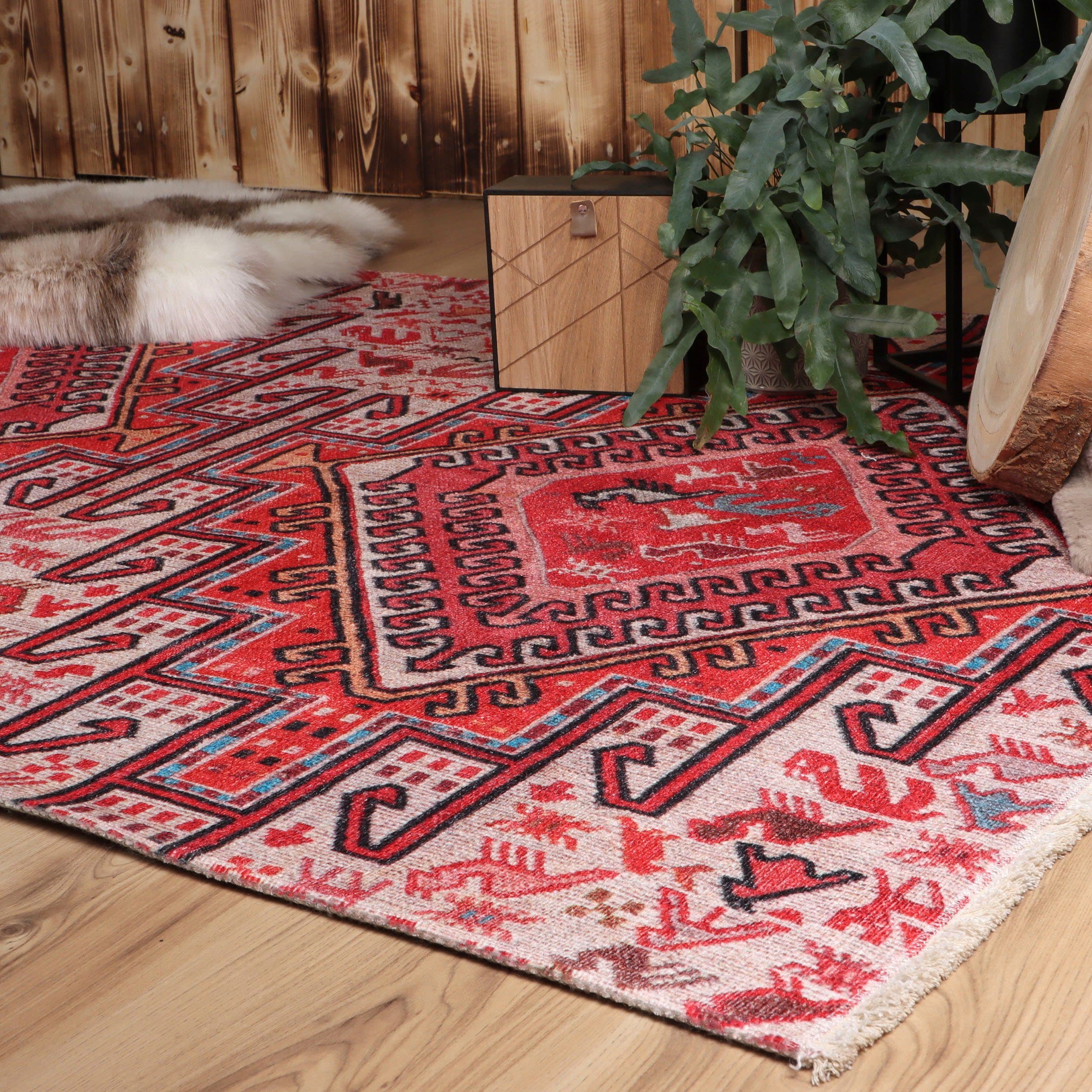 Rood vloerkleed met printjes