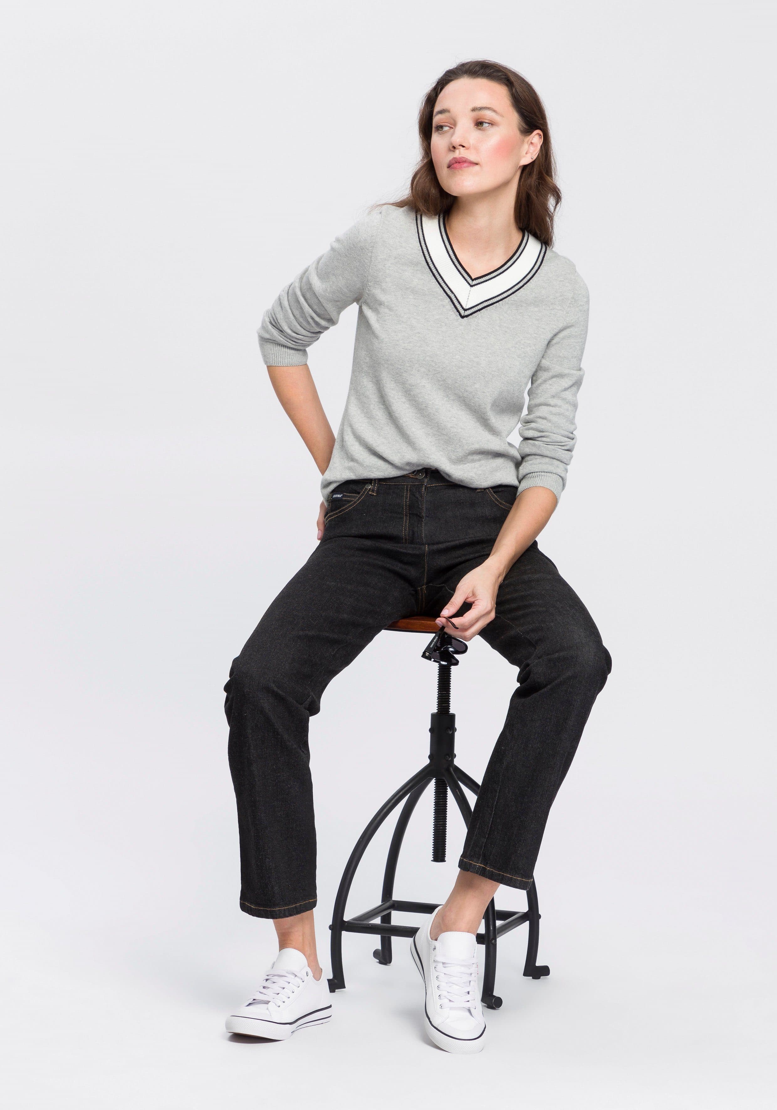 Vrouw met denim broek